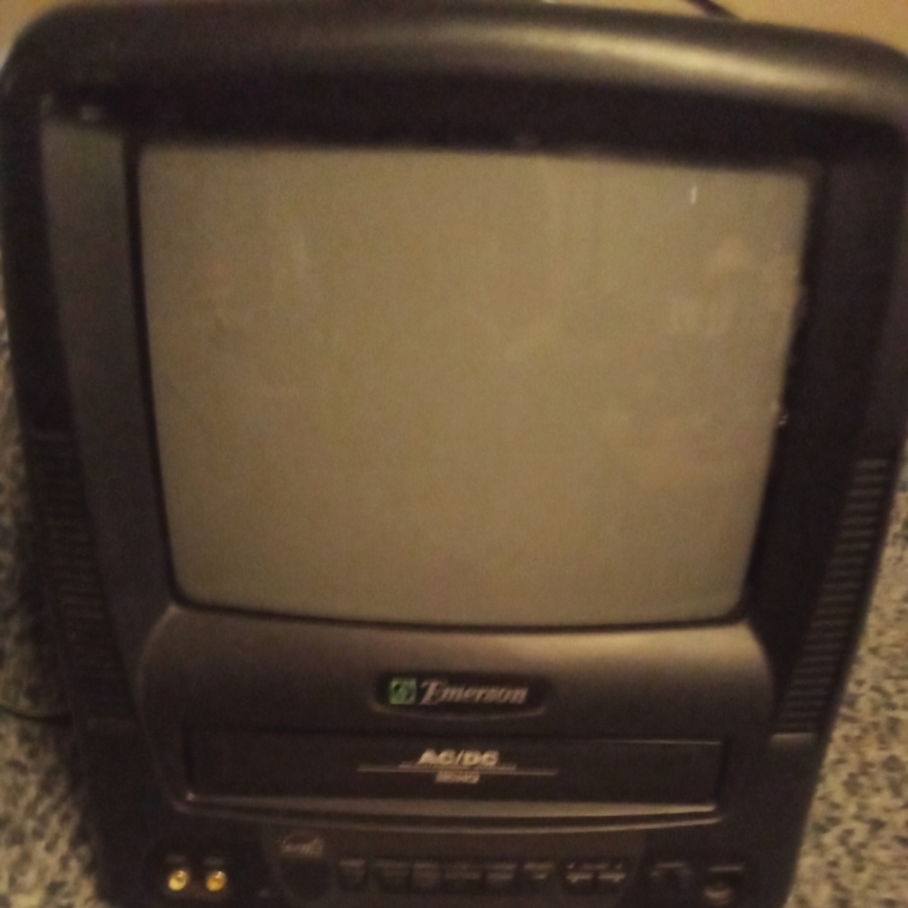 TV with v.h.s.' intact/ included"